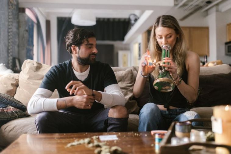 couple smoking bong
